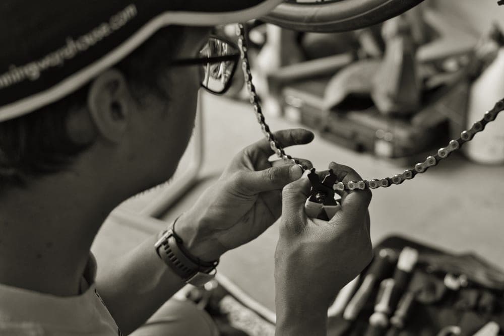 Bicycle tools laid out on a workshop bench