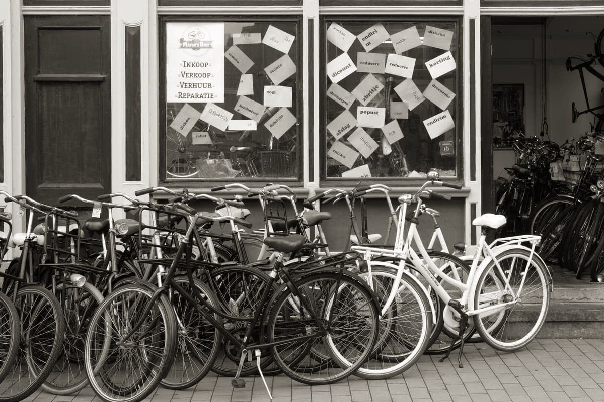 A row of second-hand bicycles for sale